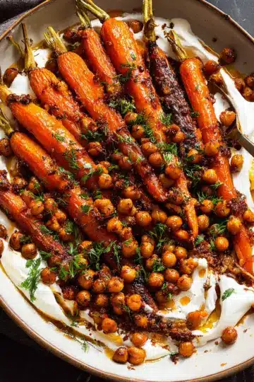 Spicy maple roast carrots with crispy chickpeas and yogurt sauce